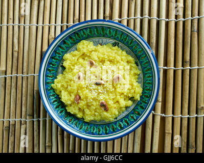 Il chutney Pongal - sud indiane riso e lenticchie Risotto con chutney di cocco Foto Stock