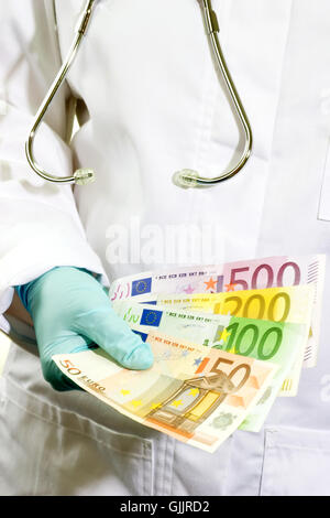 Banconote in euro uno stetoscopio Foto Stock