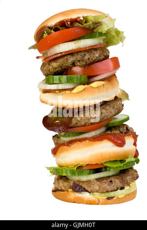 Quadruple hamburger isolato su sfondo bianco Foto Stock
