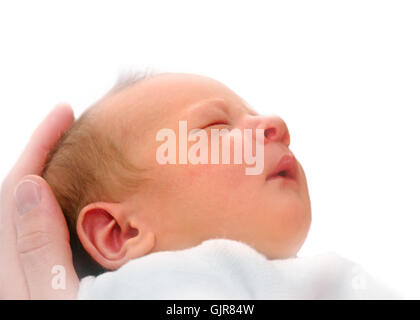 bambino di fronte a mano Foto Stock