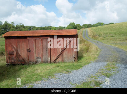 Il vecchio carro ferroviario farm store Foto Stock