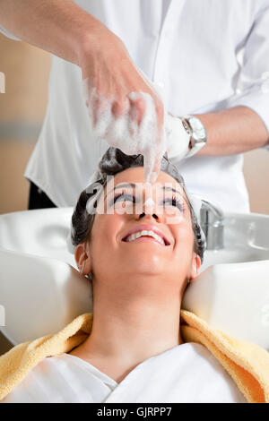 Donna ridere risate Foto Stock