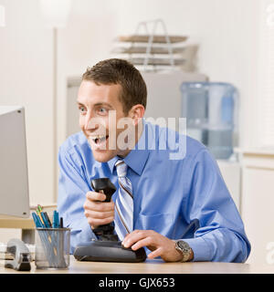 Office ridere risate Foto Stock