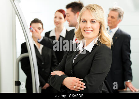 Business - team in un ufficio Foto Stock