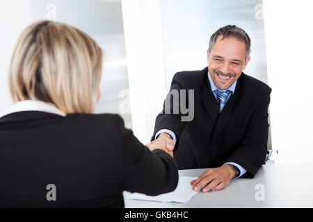 Intervista a mano a mano Foto Stock