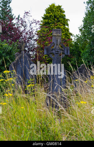 Lapidi ricoperta a Arnos Vale cimitero in Bristol Foto Stock