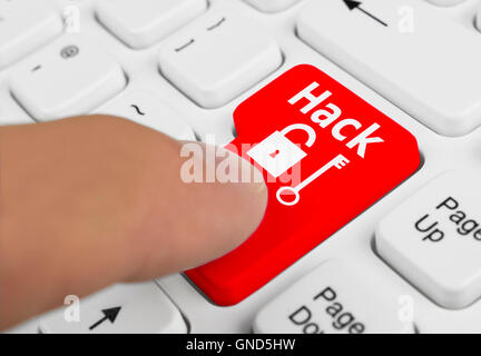 Computer hack pulsante che viene premuto sulla tastiera di un computer. Foto Stock