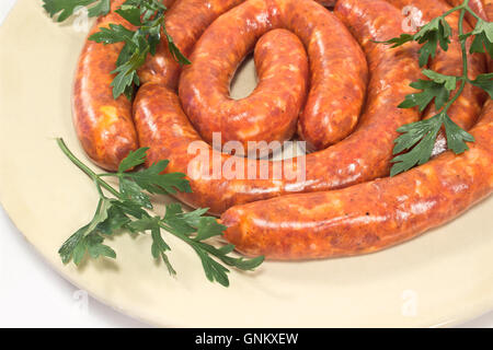 Carni salumi crudi su piastra Foto Stock