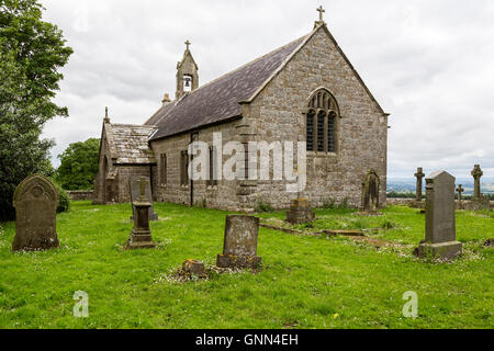 Northumberland, Inghilterra. St. Oswald la chiesa (1737 AD), tra le torrette 25A-25B, il vallo di Adriano sentiero, lato nord di B6318. Foto Stock