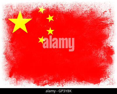 Vernice in polvere che esplodono in colori della bandiera della Cina isolato su sfondo bianco. Abstract Esplosione particelle di polvere colorata. Foto Stock