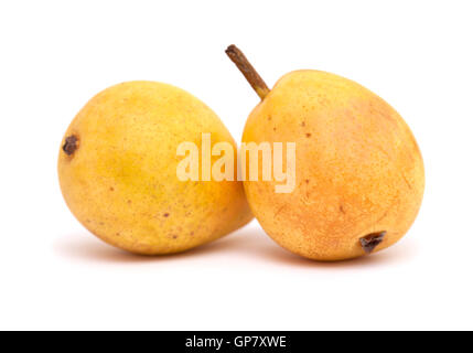 Piccolo giallo pere isolati su sfondo bianco Foto Stock