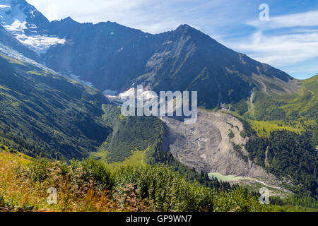 Punta del ghiacciaio di Bionnassay che mostra le quote di ritiro per il riscaldamento globale Foto Stock