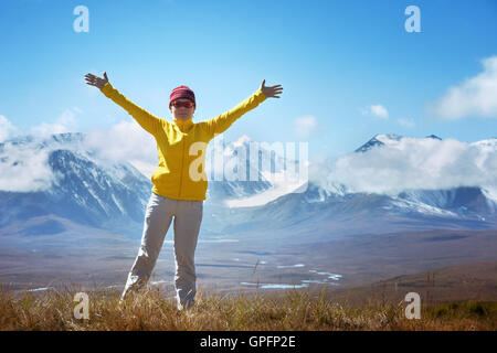 Felice trekking donna vincitore concept Foto Stock