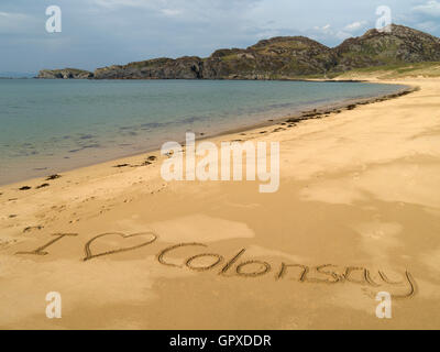 "Io amo Colonsay' scritto in spiaggia di sabbia a Kiloran Bay, sull'isola delle Ebridi di Colonsay, Scotland, Regno Unito. Foto Stock