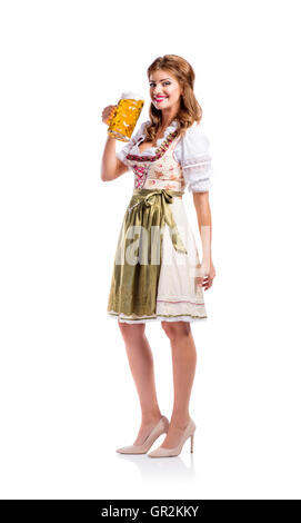 La donna nel tradizionale abito bavarese di bere birra Foto Stock
