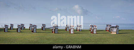 Sedie a sdraio sulla diga, Norderney, Est Frisone Isola, Frisia orientale, Bassa Sassonia, Germania, Europa Foto Stock