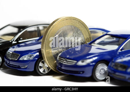 Euro moneta e vetture di lusso Foto Stock