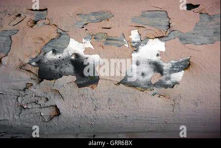 Scheggiati placcatura metallica sulla parete graffiato , sfondo grunge Foto Stock