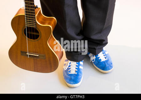 Ukulele e Busker in Studio Foto Stock