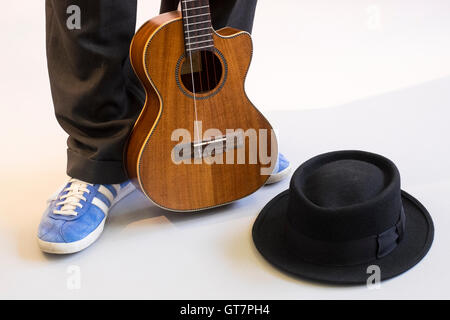 Ukulele e Busker in Studio Foto Stock