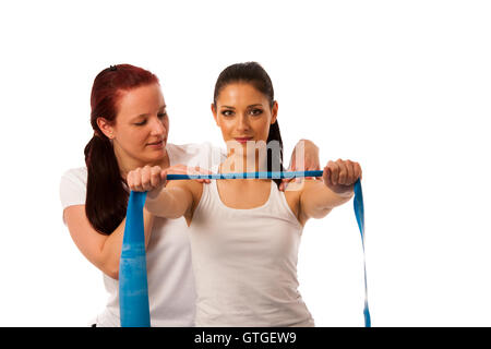 Fisioterapia - terapista braccio facendo esercizi strenghteninh con un paziente per recuperare la forza dopo la lesione Foto Stock