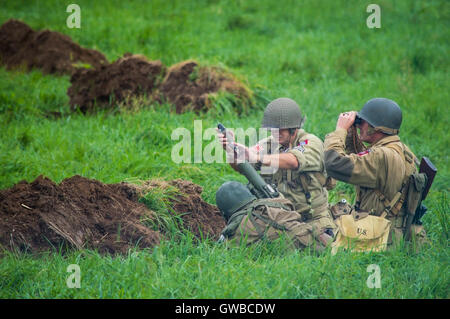 US Army ottantaduesima Airborne team di malta la cottura di una shell. Foto Stock