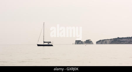 Una calma prima della tempesta. Gora mare a Shell Bay, Studland, Dorset, Regno Unito. Foto Stock