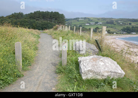 Spiaggia; Cushendun; nella contea di Antrim, Irlanda del Nord Foto Stock