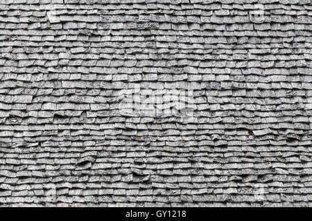 Foto di sfondo texture di grigio vecchio tetto in legno il tiling Foto Stock