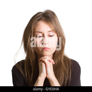 Ritratto di un attraente bella piuttosto carino giovane donna caucasica (lady, ragazza, femmina, persona) vestito nero e la preghiera Foto Stock