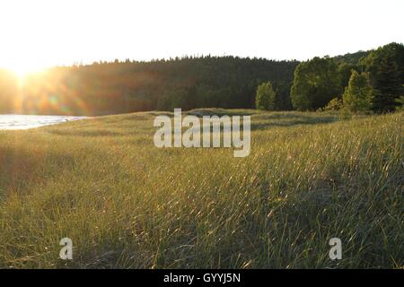 Tramonto in un lago nel nord Foto Stock