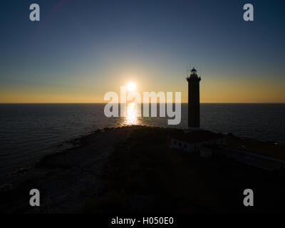 Faro al tramonto in Veli Rat in Croazia Foto Stock