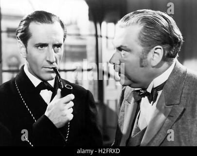 Le avventure di Sherlock Holmes 1939 Twentieth Century Fox Film con basilico Rathbone a sinistra e Nigel Bruce Foto Stock