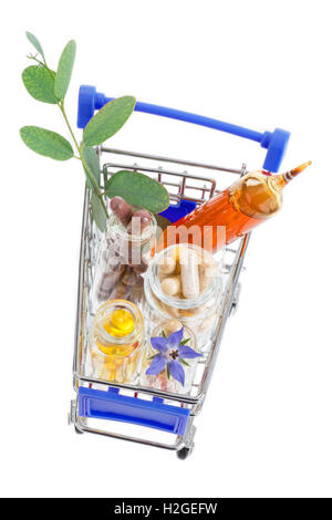 Carrello pieno di farmaco ,pillole medicinali ,piante e integratore alimentare Foto Stock