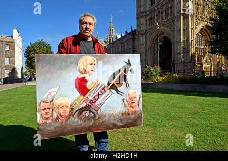Kaya Mar - Fumettista politico - con uno dei suoi dipinti in Westminster - Brexit: Theresa Maggio, Liam Fox, Boris Johnson, ... Foto Stock
