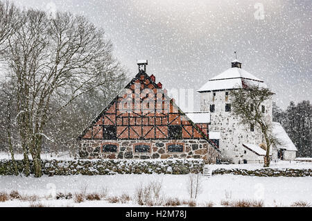 Vista di una coperta di neve Hovdala Castello nella regione Hassleholm. Hovdala Castle è un castello in Hassleholm comune, Scania, in modo Foto Stock