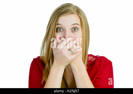 Attraente donna bionda è sconvolta o sorpresa Foto Stock