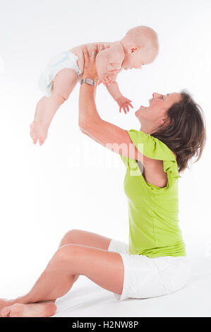 Madre e dieci-mese-vecchio baby Foto Stock