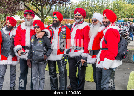La religione sikh i motociclisti club partecipare all'annuale Vancouver moto giocattolo di Natale corsa,Vancouver, British Columbia, Canada Foto Stock