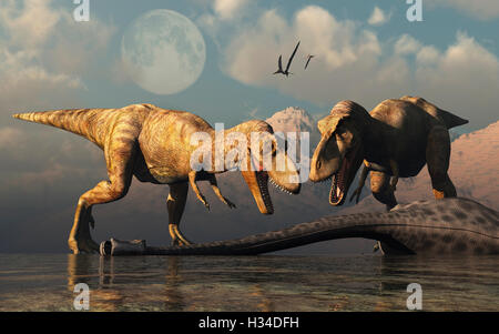 Una coppia di T.REX ,l'alimentazione dai resti di un dinosauro Sauropod . Foto Stock