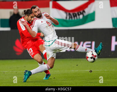 Budapest, Ungheria. 07 ott 2016. BUDAPEST, Ungheria - 7 ottobre: Ricardo Rodriguez #13 della Svizzera i punteggi della seconda meta del suo team il prossimo ad Attila Fiola #5 di Ungheria durante il 2018 FIFA World Cup Qualifier match tra Ungheria e Svizzera a Groupama Arena il 7 ottobre 2016 a Budapest, Ungheria. Credito: Laszlo Szirtesi/Alamy Live News Foto Stock