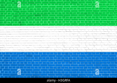 Sierra Leone ufficiale nazionale bandiera. Africa simbolo patriottico, banner, elemento dello sfondo. Bandiera della Sierra Leone su un muro di mattoni Foto Stock