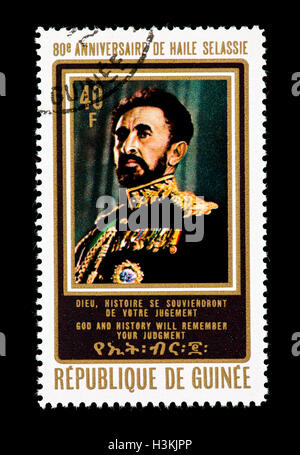 Francobollo della Guinea raffigurante l'imperatore Haile Selassie. Foto Stock