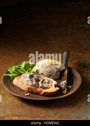 Arrosto di Funghi Paté in crosta di pane e rucola Foto Stock