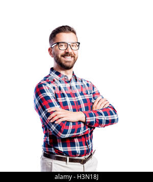 Hipster Uomo in camicia controllati, studio shot, isolato Foto Stock
