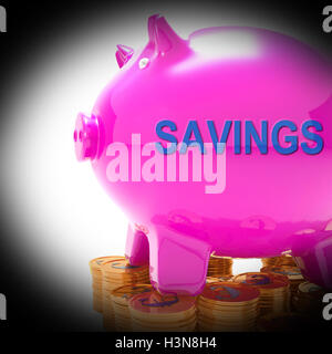 Risparmio Salvadanaio monete mezzi dei fondi di riserva e conto bancario Foto Stock