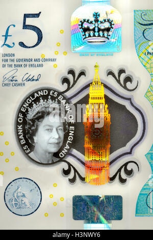 Nuova (2016) British in plastica 5 sterline nota che mostra le funzioni di sicurezza: trasparente 'Watermark'; Big Ben holgram; 'Eurion constellation' - Foto Stock