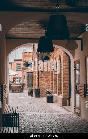 Immagine di accogliente vicolo di Halmstad, Svezia. Vintage tonica. Foto Stock