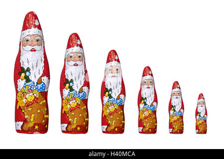 Il cioccolato Nicholases, dimensione in modo diverso, solo editorialmente! Nicholas, yule tide, periodo natalizio, cioccolato, dolci, dolcemente, dolci, cioccolato Nicholases, differenza di dimensione, scelta, varietà, still life, la fotografia del prodotto, tagliate, studio Foto Stock