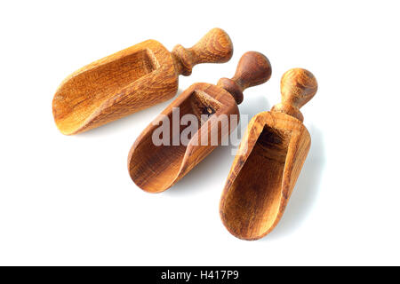 Tre pale in legno per le spezie su bianco Foto Stock